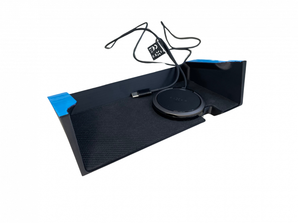 Storage tray s wireless charging under the dashboard