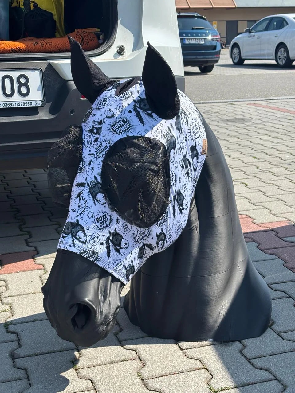 Large masked sculpture